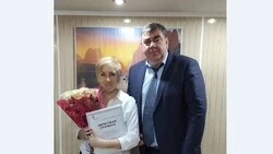 За многолетний вклад в развитие физкультуры и спорта района